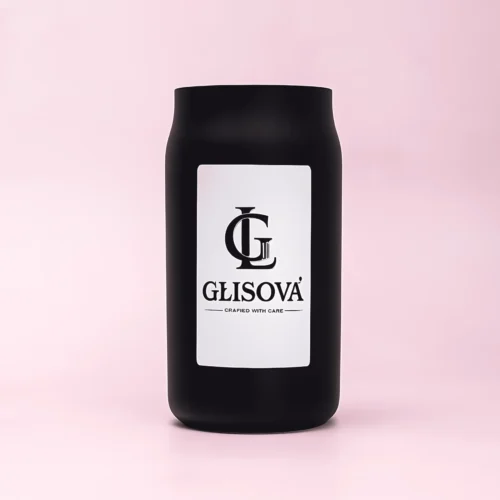GLISOVA artisan candle with a blue rim in a home setting.