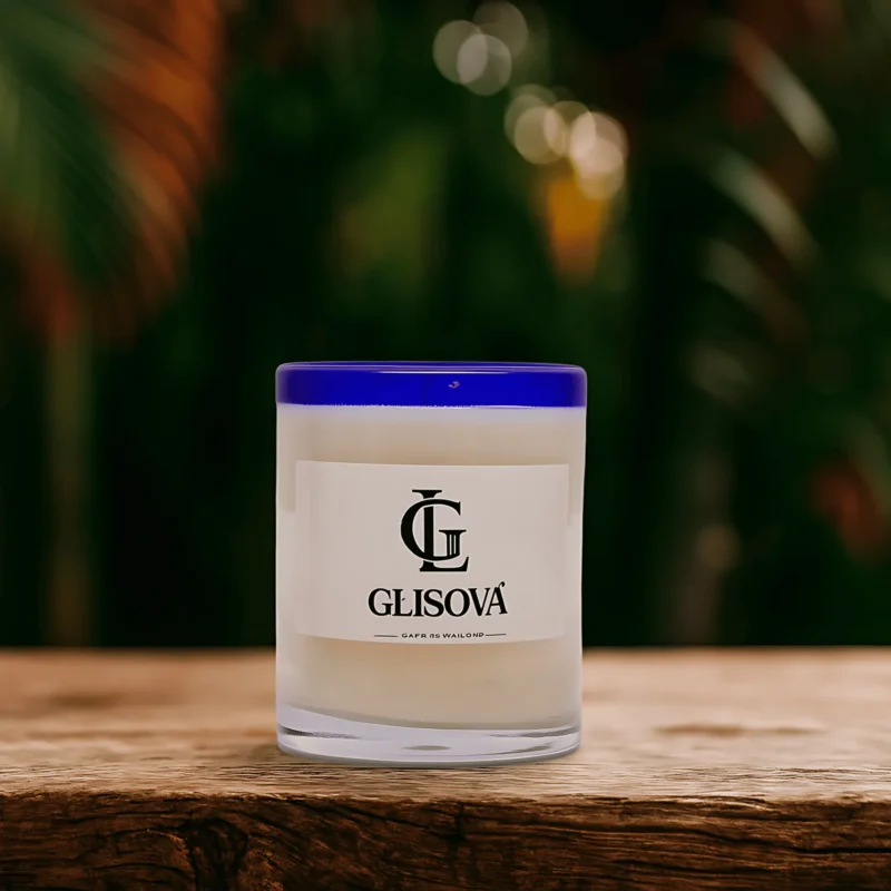 Hand-poured natural soy wax candle on a pink background