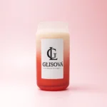 Lifestyle image of a GLISOVA candle on an outdoor table