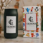 Two GLISOVA Horizon Collection candles on display.