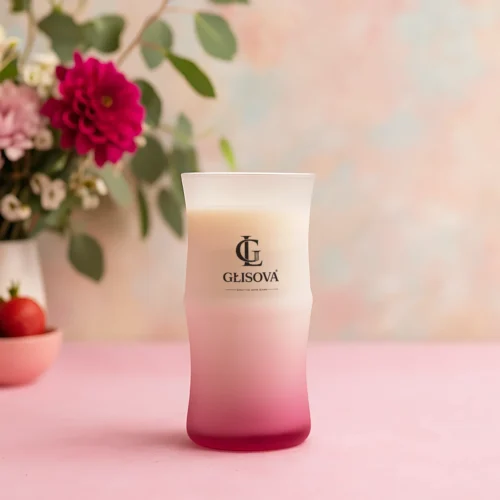 GLISOVA Aura Collection soy candle in a frosted pink ombre jar
