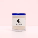 GLISOVA artisan candle with a blue rim in a home setting